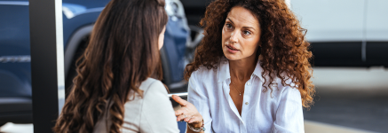 car dealership team meeting